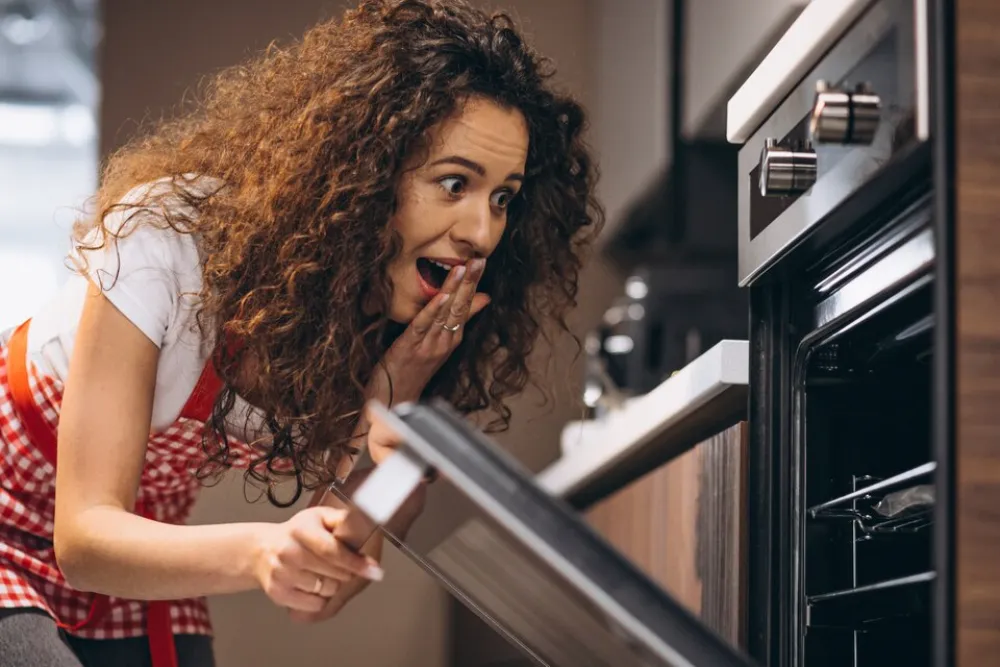 Surprised woman after using LG oven