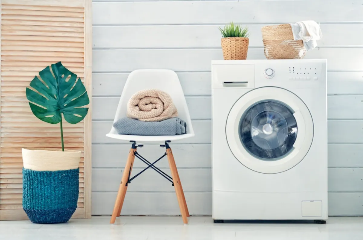 A laundry room with Electrolux washer